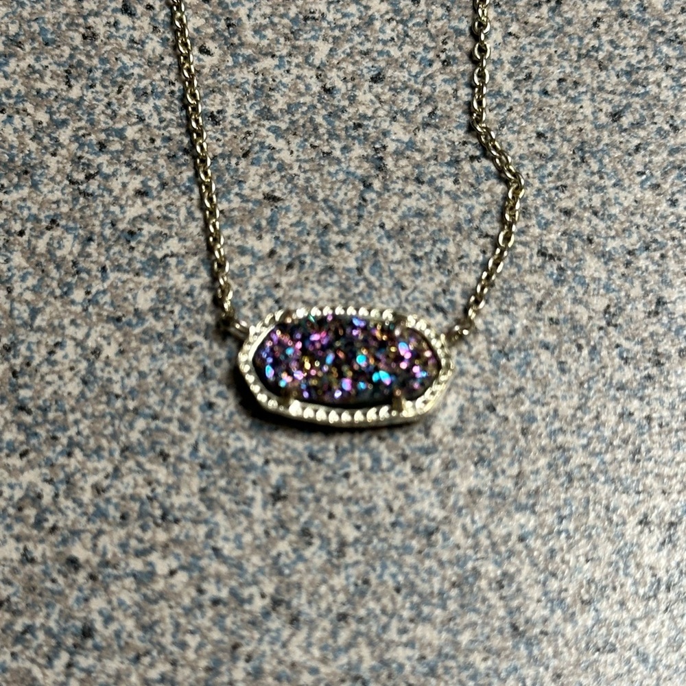 Kendra Scott necklace.
